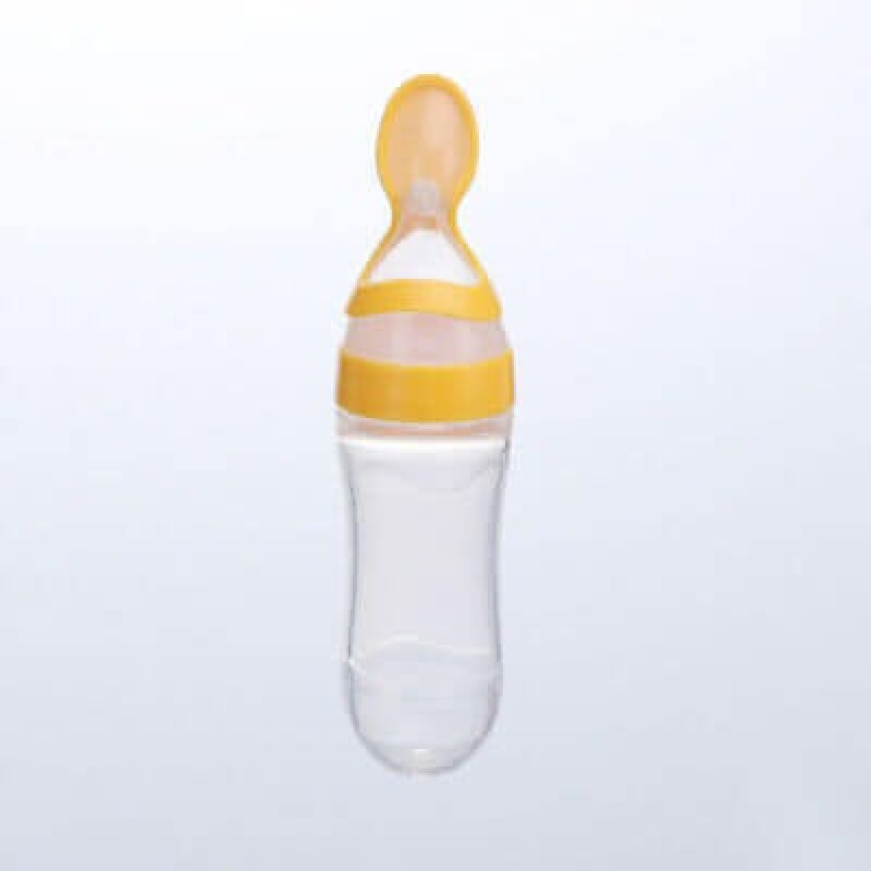 A cup with a spoon for the bed